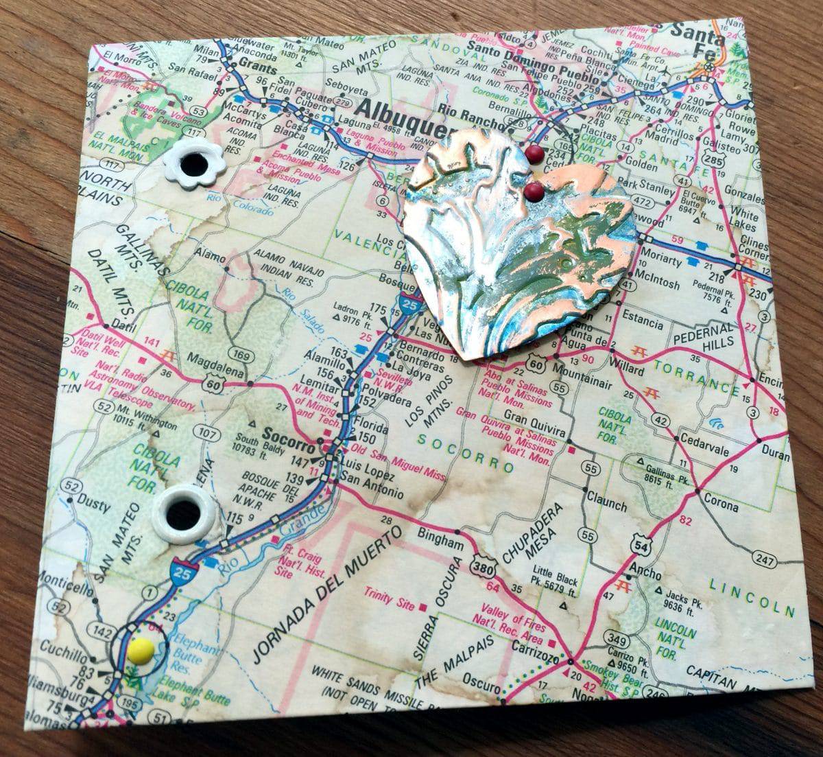 This map card illustrates the mixed media project of the month for Mary Ellen Beads Albuquerque and the Collaborheartists.